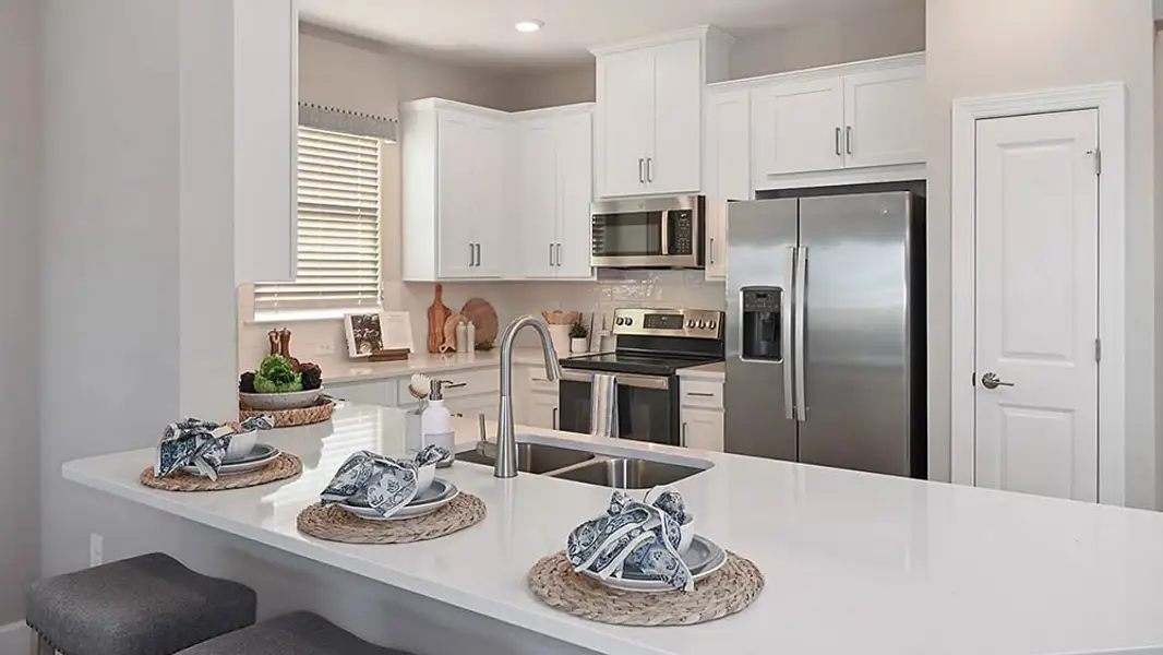 Representative furnished interior of a home built from the Caicos by Taylor Morrison in Skye Ranch Community Group Page, Sarasota (Image 4).