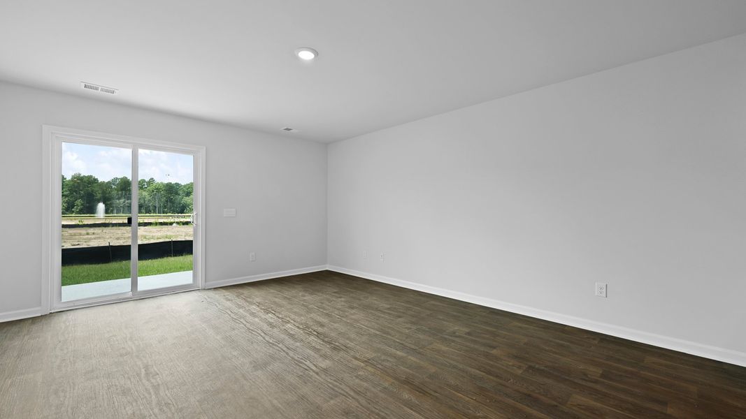 Spacious, unfurnished interior of a new home in Pine Hills Townhomes at Cane Bay, Summerville (Image 17).