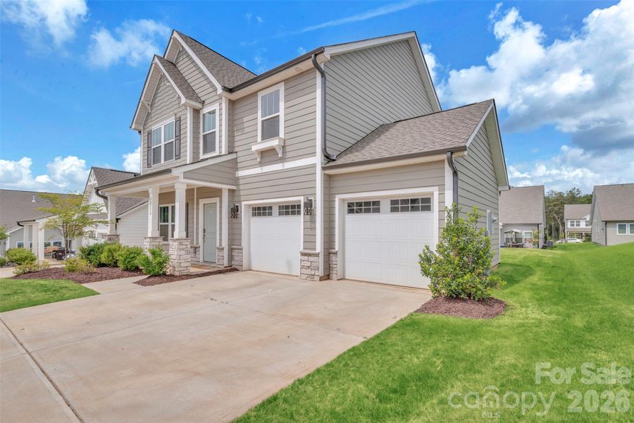 Front exterior of a new home in Edgewater - The Links, Lancaster, SC, highlighting curb appeal (Image 29).