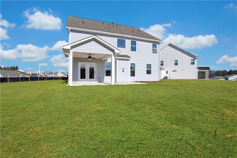 Exterior details and patio area of a home in Twin Lakes, Hoschton (Image 31).