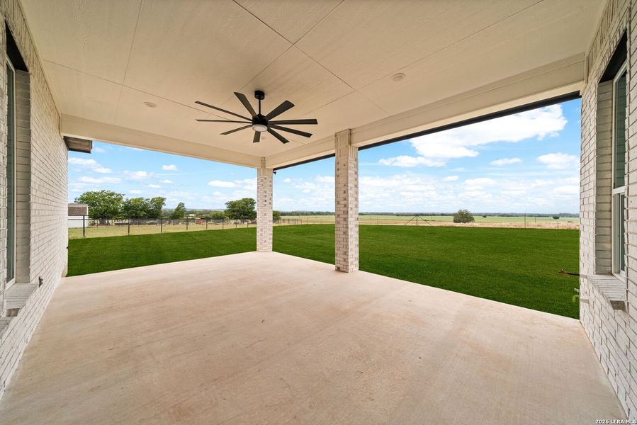 Exterior details and patio area of a home in , Castroville (Image 3).