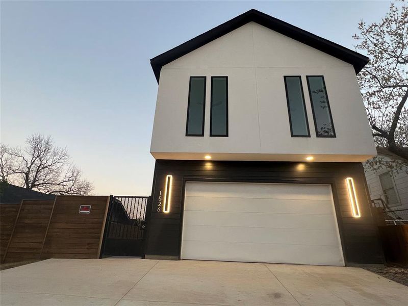 Front exterior of a new home in , Dallas, TX, highlighting curb appeal (Image 15).