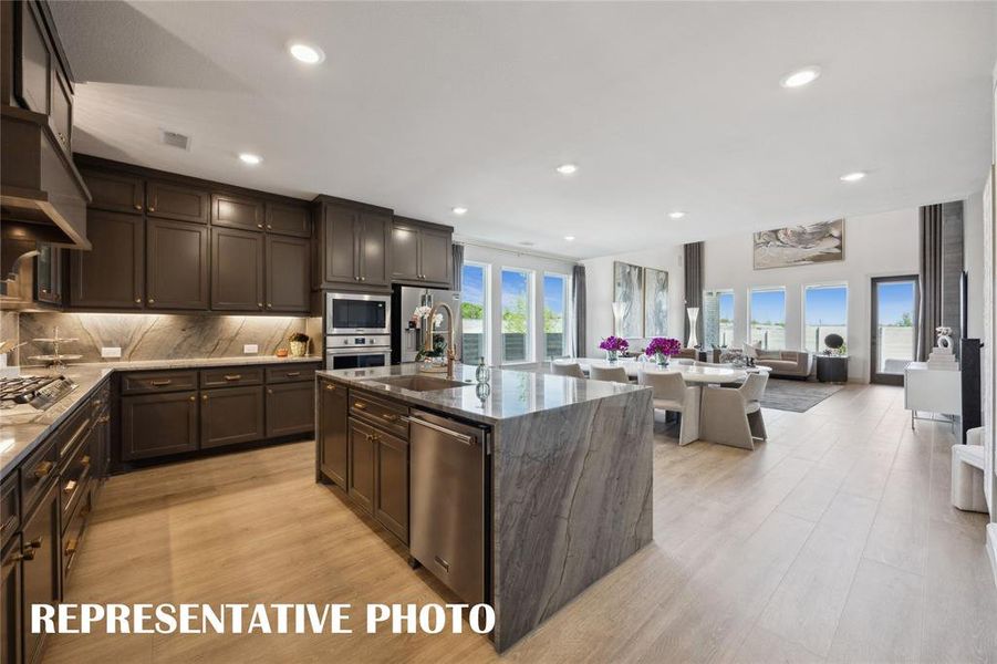 Designed for entertaining, you will love everything about our beautiful new homes in Painted Tree Woodlands West!  REPRESENTATIVE PHOTO OF MODEL HOME