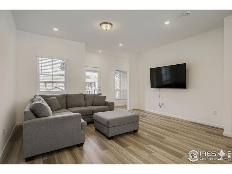 Spacious Great Room that flows onto the covered balcony (level 2)