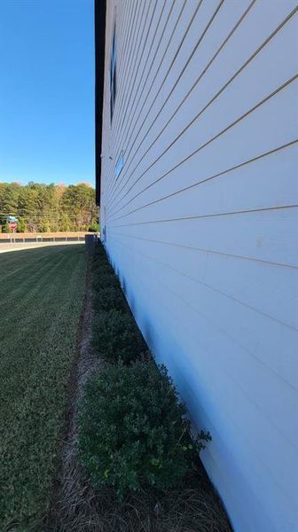 Exterior details and patio area of a home in The Reserve at Bells Ferry, Kennesaw (Image 33).