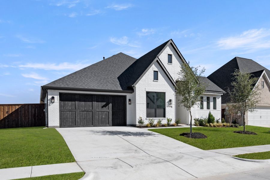 Front exterior of a new home in Bridgewater, Midlothian, TX, highlighting curb appeal (Image 2). Front exterior of a new home in Bridgewater, Midlothian, TX, highlighting curb appeal (Image 2).