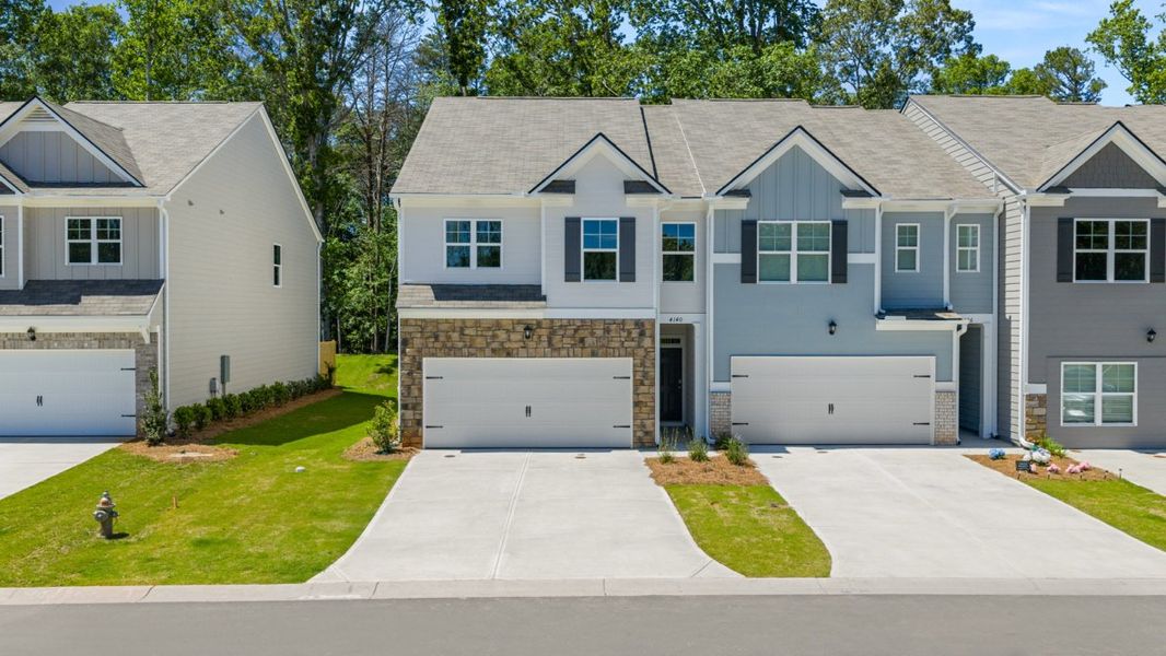 Representative exterior photo of a completed home built from the SUDBURY 24' TOWNHOME by D.R. Horton in Falcon Landing Townhomes, Gainesville, GA (Image 1).