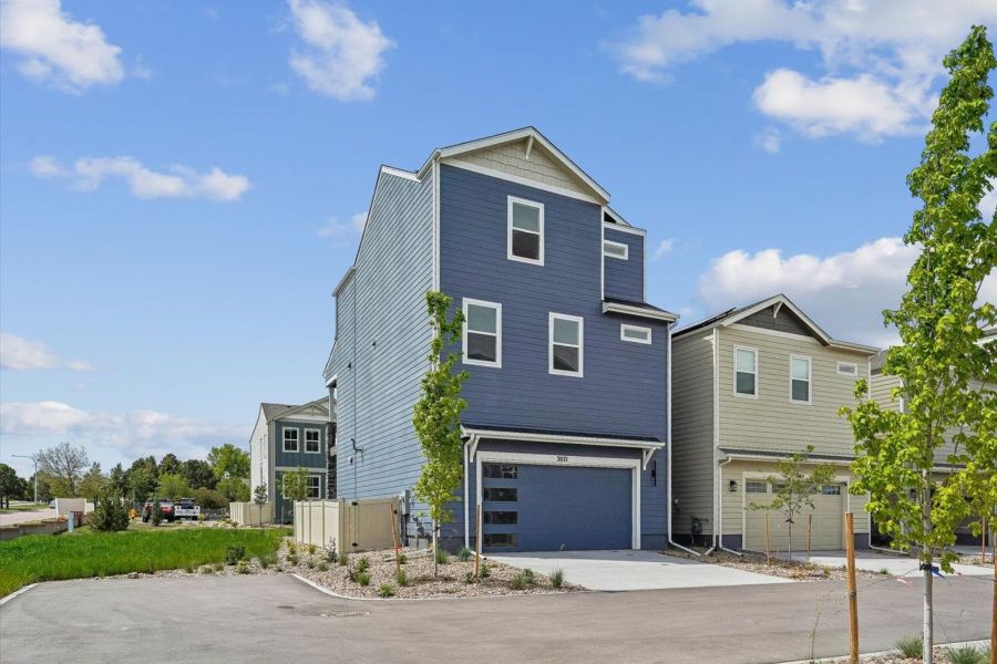 Front exterior of a new home in Pony Park, Colorado Springs, CO, highlighting curb appeal (Image 19).