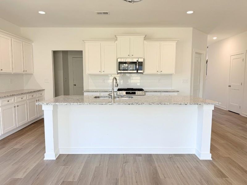 Furnished interior view inside a new home in Sutton's Landing, Statham (Image 7).