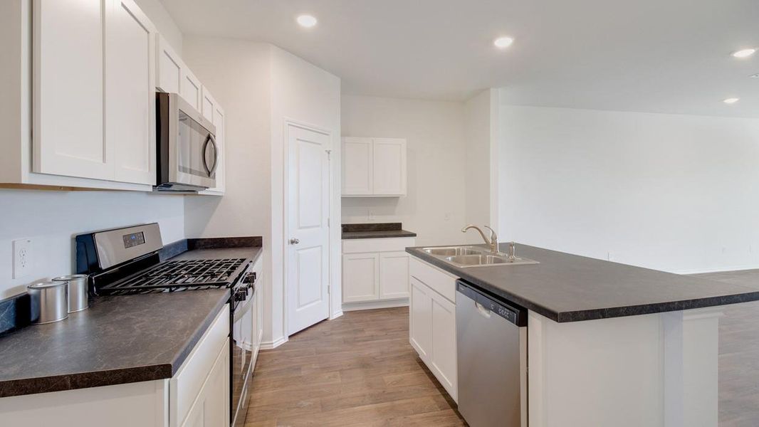 Furnished interior view inside a new home in Wayside, Uhland (Image 8).