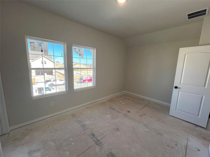In-progress construction of a new home in The Homestead at Lariat, Liberty Hill, TX (Image 27).