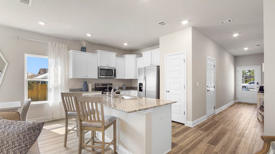 Representative furnished interior of a home built from the Palm Exterior by D.R. Horton in Hawks Landing Townhomes, Santa Rosa Beach (Image 9).