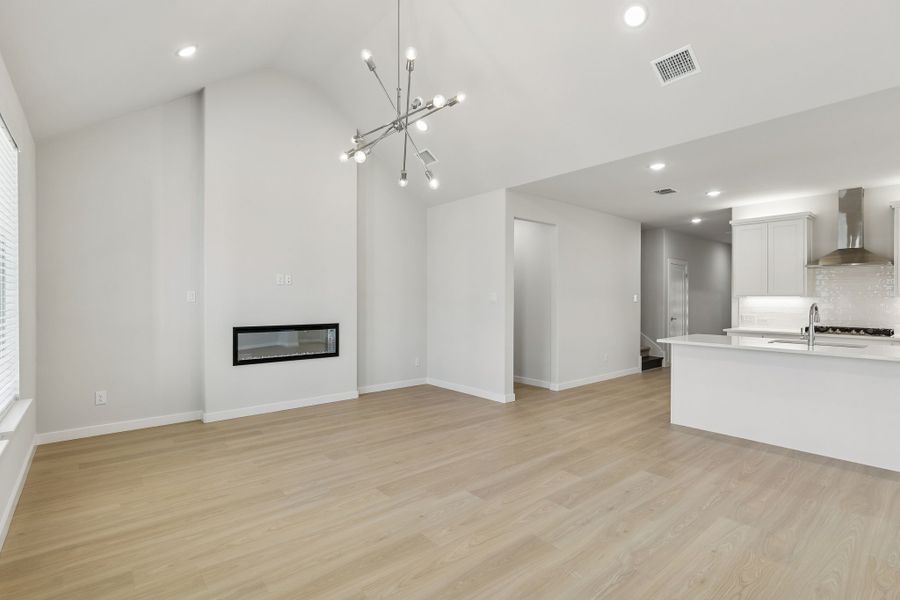 Living Room in the Masters home plan by Trophy Signature Homes – REPRESENTATIVE PHOTO