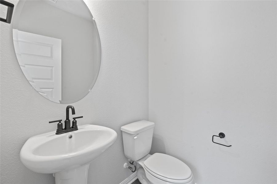 Bathroom with a sink and toilet