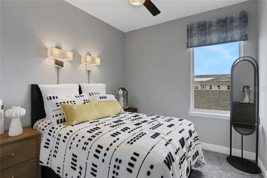 Furnished interior view inside a new home in Serenade at Ovation, Winter Garden (Image 16).