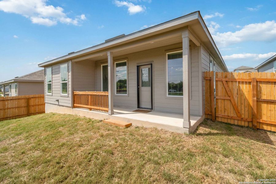 Front exterior of a new home in Sage Meadows: Coastline Collection, St. Hedwig, TX, highlighting curb appeal (Image 19). Front exterior of a new home in Sage Meadows: Coastline Collection, St. Hedwig, TX, highlighting curb appeal (Image 19).