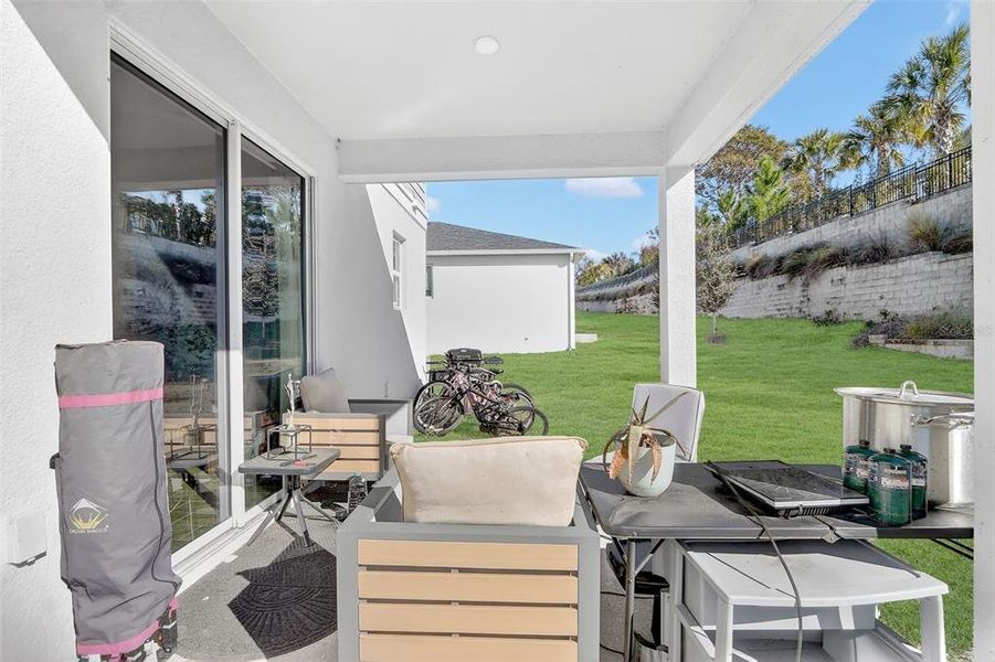 Exterior details and patio area of a home in The Reserve at Lake Ridge, Minneola (Image 23).