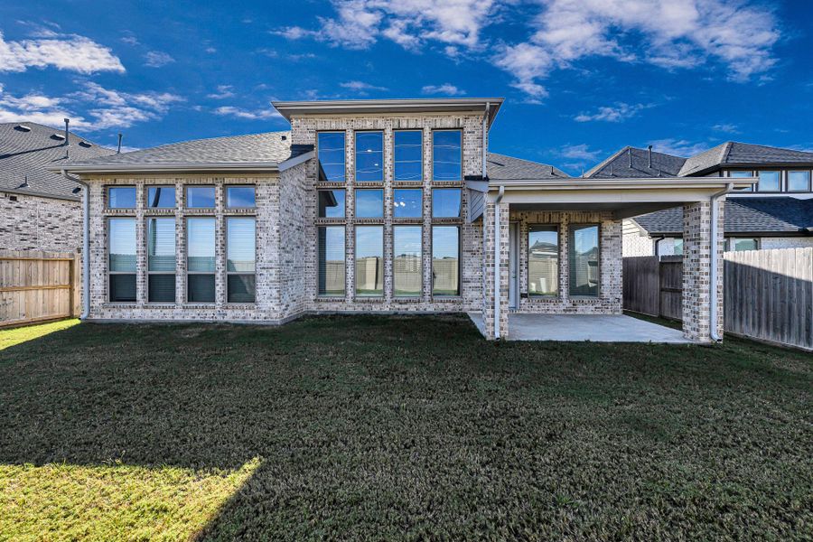 Exterior details and patio area of a home in Cross Creek West 55', Fulshear (Image 3). Exterior details and patio area of a home in Cross Creek West 55', Fulshear (Image 3).
