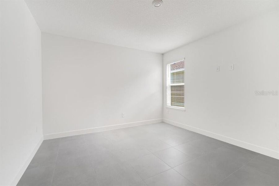 Spacious, unfurnished interior of a new home in Harvest at Ovation, Winter Garden (Image 28). Spacious, unfurnished interior of a new home in Harvest at Ovation, Winter Garden (Image 28).