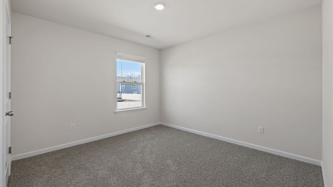 Spacious, unfurnished interior of a new home in Bentley Park, Greenwood (Image 27).