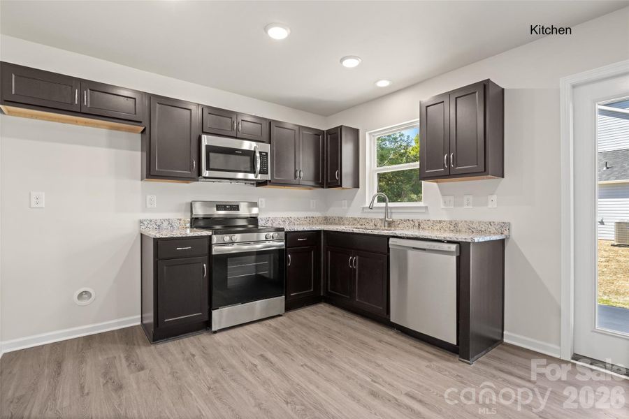 Furnished interior view inside a new home in , Lancaster (Image 8).