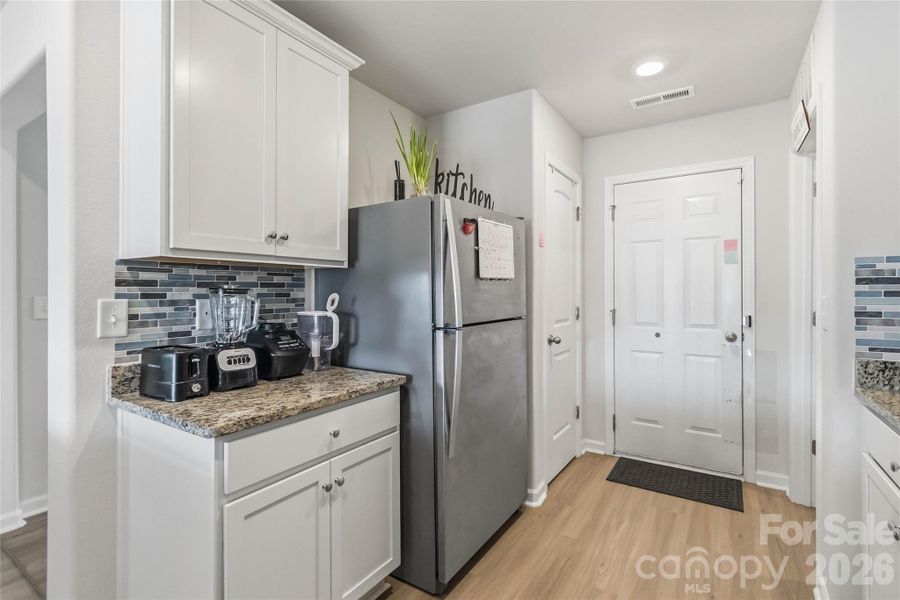 Furnished interior view inside a new home in McKee Creek Village, Charlotte (Image 14).
