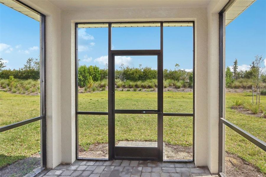 Exterior details and patio area of a home in Crescent Lakes - Premier Series, Punta Gorda (Image 2). Exterior details and patio area of a home in Crescent Lakes - Premier Series, Punta Gorda (Image 2).