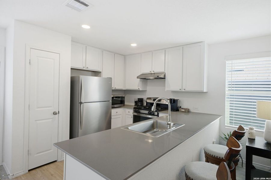 Furnished interior view inside a new home in Lodi Grove, Floresville (Image 16).