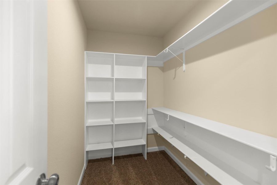 This bathroom features a clean, modern shower with beige tile walls, a chrome showerhead, and a bathtub. There's a towel ring and bar for convenience, with soft lighting creating a warm atmosphere. This bathroom features a clean, modern shower with beige tile walls, a chrome showerhead, and a bathtub. There's a towel ring and bar for convenience, with soft lighting creating a warm atmosphere.