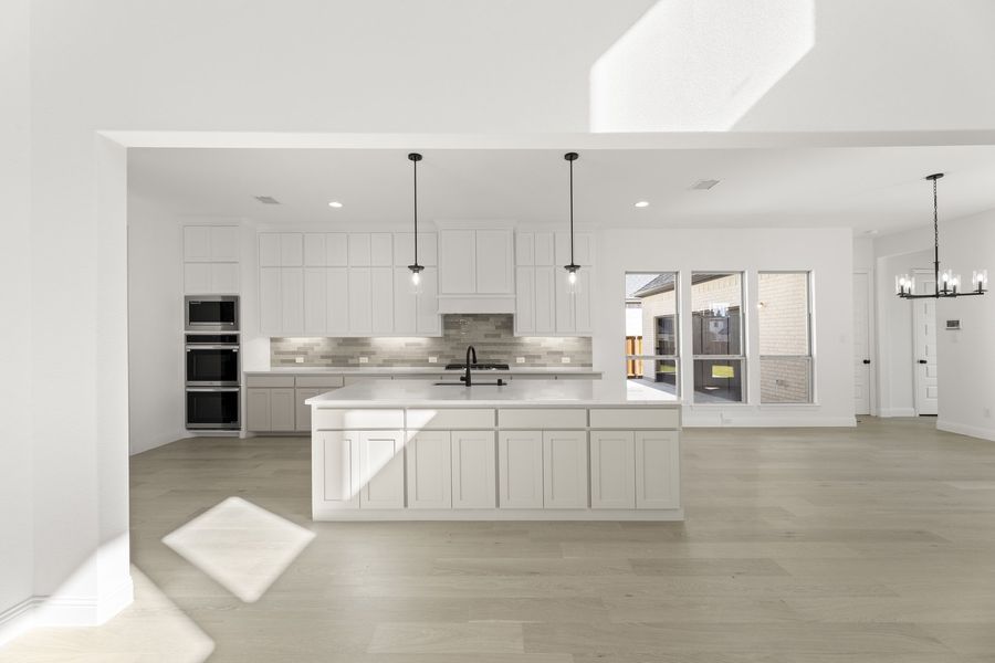 Representative furnished interior of a home built from the Hadley by Windsor Homes in Winding Creek, Rockwall (Image 9).