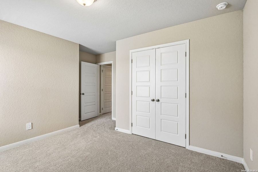 Spacious, unfurnished interior of a new home in Royal Crest, San Antonio (Image 54).