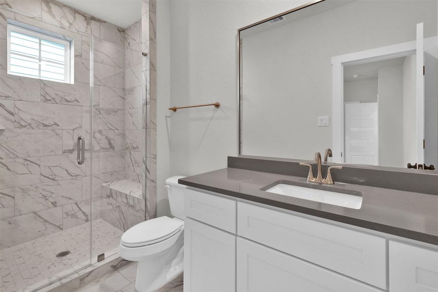 1st Floor Guest Bathroom *Representative photo of the same floor plan, selections will vary