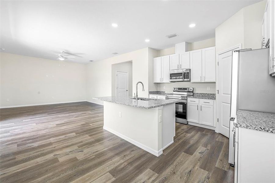 Furnished interior view inside a new home in , Weeki Wachee (Image 13).