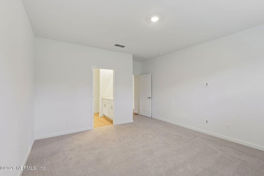 Spacious, unfurnished interior of a new home in Colbert Landings, Palm Coast (Image 18).
