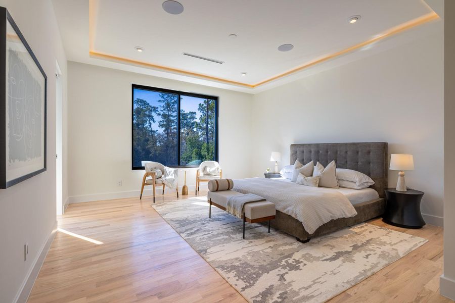 Second primary suite located upstairs featuring generous proportions and en-suite bath. Second primary suite located upstairs featuring generous proportions and en-suite bath.