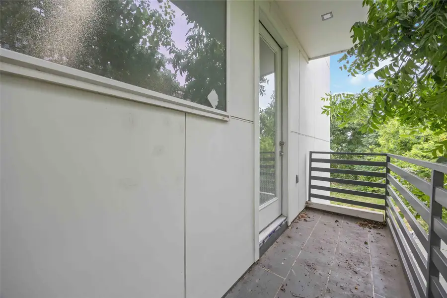 Exterior details and patio area of a home in , Houston (Image 3).