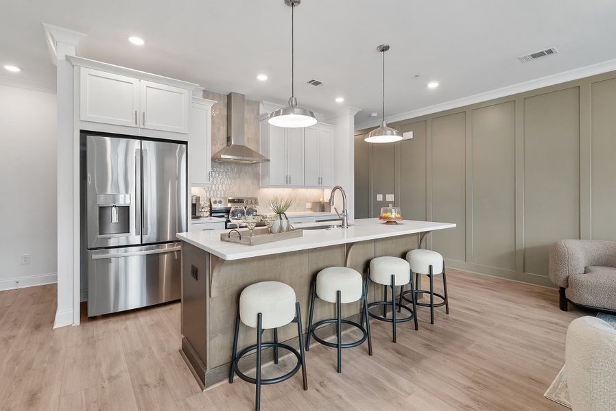 Representative furnished interior of a home built from the The Oleander by The Providence Group in Market Square at Sawnee Village, Cumming (Image 18).