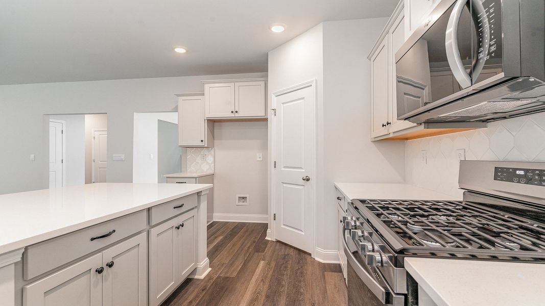 Representative furnished interior of a home built from the Westerly by D.R. Horton in Lake Tide Summit, Chapin (Image 7).