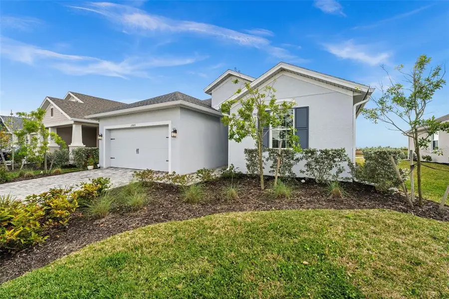Front exterior of a new home in , Punta Gorda, FL, highlighting curb appeal (Image 2).