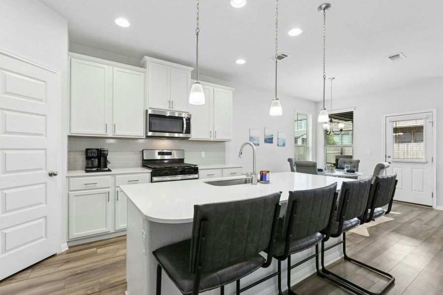 Walk-in pantry and stainless steel appliances provide workability in your kitchen. Walk-in pantry and stainless steel appliances provide workability in your kitchen.