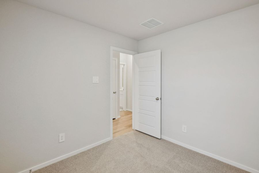 Spacious, unfurnished interior of a new home in Granger Pointe - Traditional Series, Conroe (Image 24).