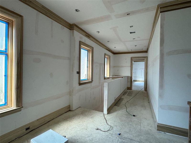 Hallway to the Primary Suite. Under construction as of 1/19/24.