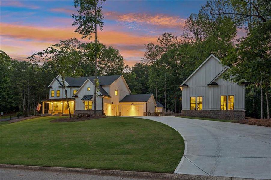 Front exterior of a new home in , Gainesville, GA, highlighting curb appeal (Image 32). Front exterior of a new home in , Gainesville, GA, highlighting curb appeal (Image 32).