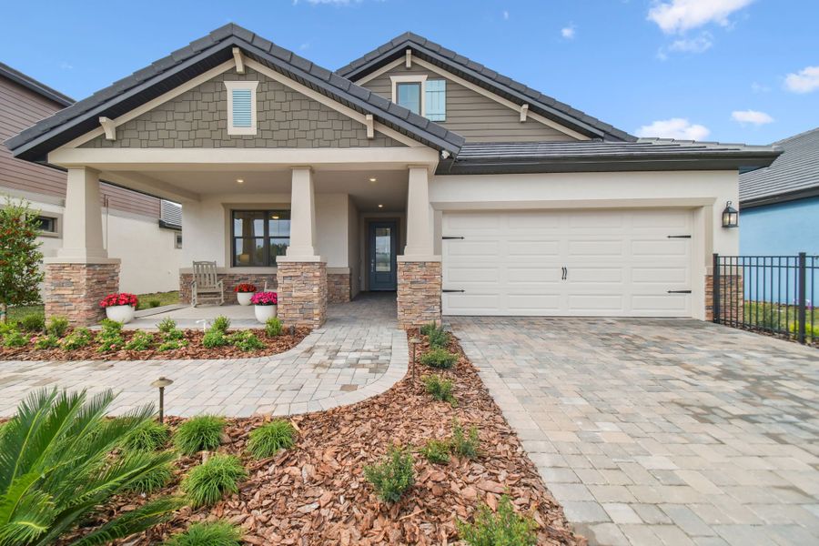 Representative exterior photo of a completed home built from the Sweetwater by William Ryan Homes in The Sanctuary – Resort Collection, Punta Gorda, FL (Image 26).