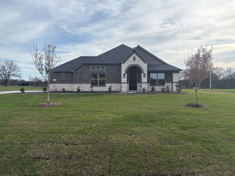 Front exterior of a new home in , Lowry Crossing, TX, highlighting curb appeal (Image 14).