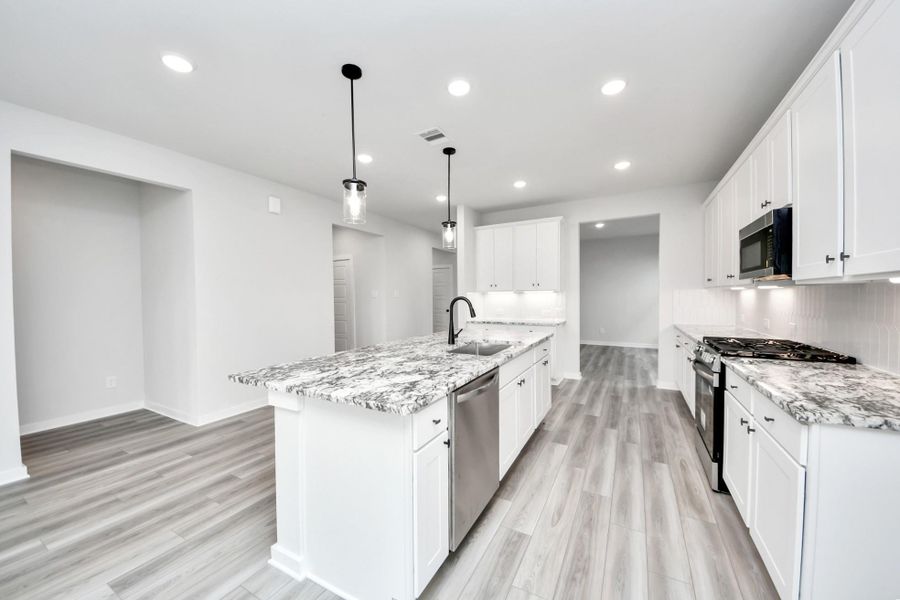 Furnished interior view inside a new home in Sundance Cove, Crosby (Image 8).