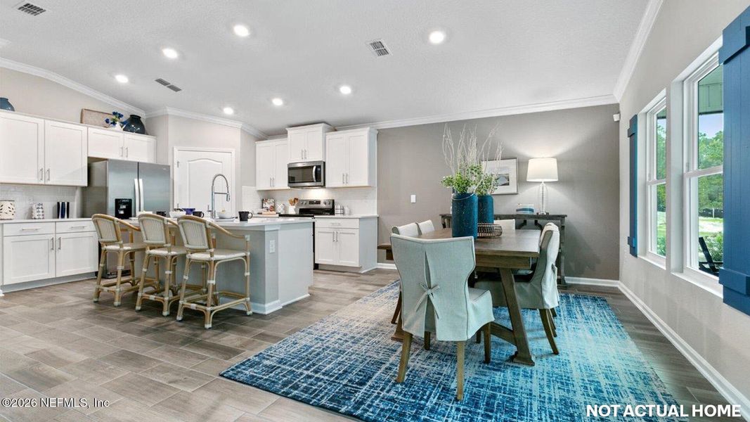 Furnished interior view inside a new home in American Village, Palm Coast (Image 9).