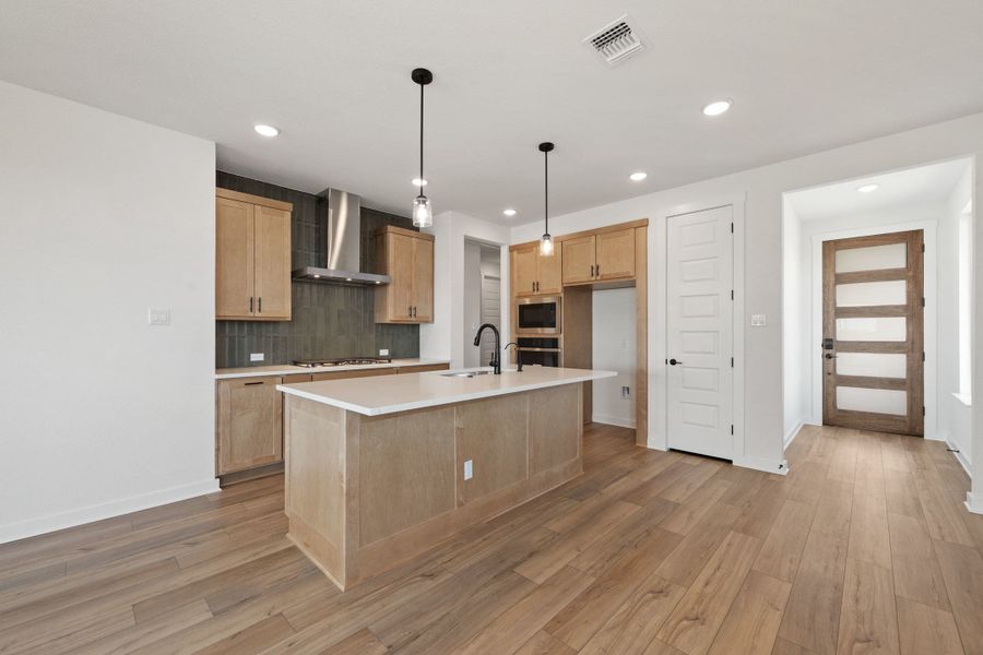 Furnished interior view inside a new home in Flora, Hutto (Image 14).