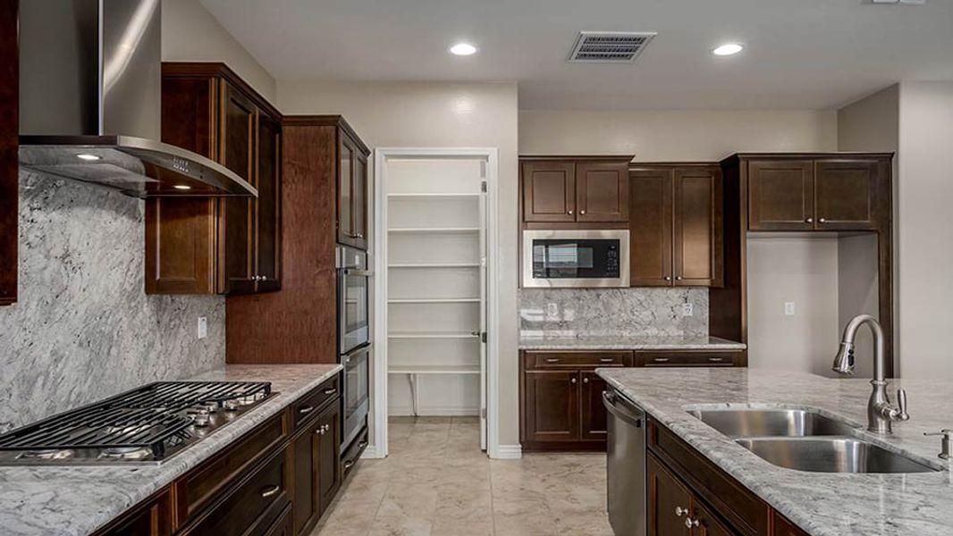 Representative furnished interior of a home built from the 45RM2 by Taylor Morrison in Almeria at Rancho Mercado, Surprise (Image 18). Representative furnished interior of a home built from the 45RM2 by Taylor Morrison in Almeria at Rancho Mercado, Surprise (Image 18).