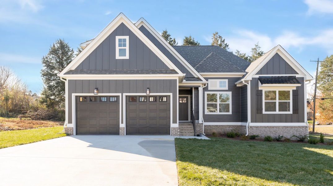 Front exterior of a new home in Creekside, Cleveland, TN, highlighting curb appeal (Image 29).
